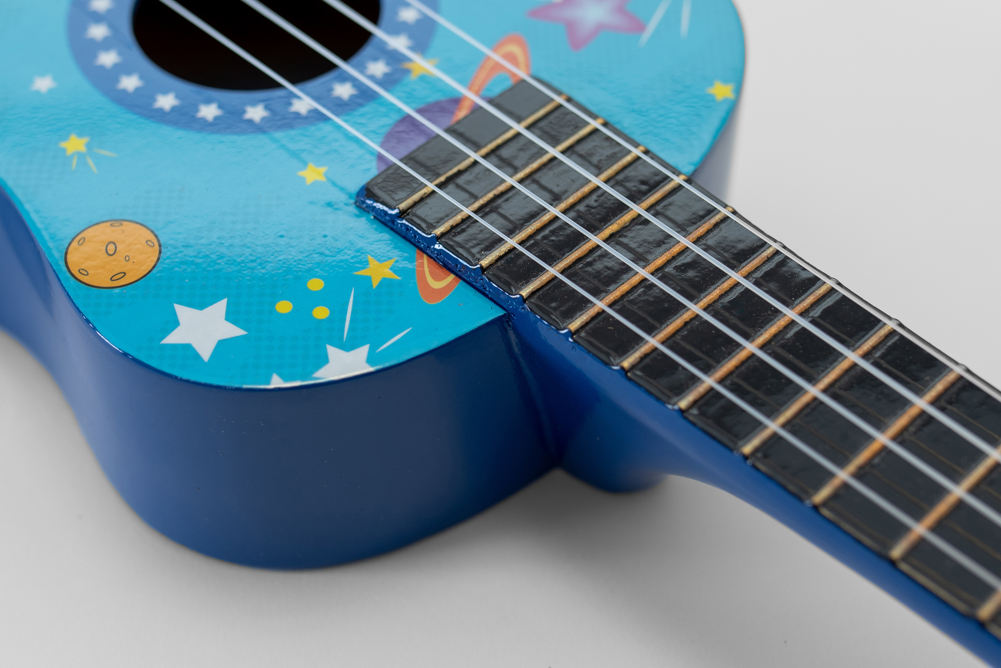 Ukulele sopranowe Rakiety Pokrowiec Struny Kostki Stroik Akordy ZESTAW