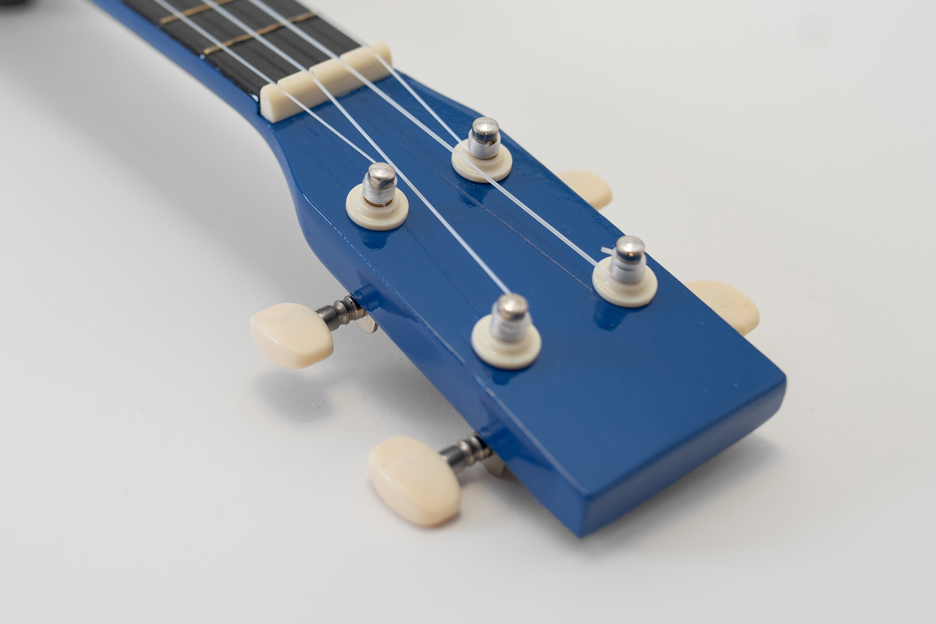 Ukulele sopranowe Rakiety Pokrowiec Struny Kostki Stroik Akordy ZESTAW